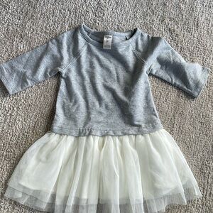 Never worn but not tags Oshkosh grey sparkly dress with white ruffle. 2T